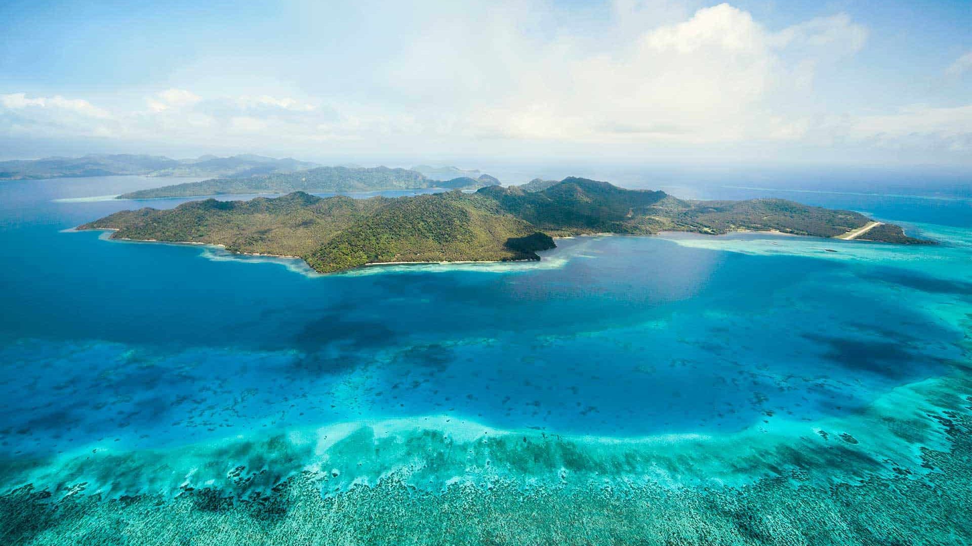 Laucala Island CLaucala Island CLI---Aerial---South-CoastLI---Aerial-view---Over-ocean