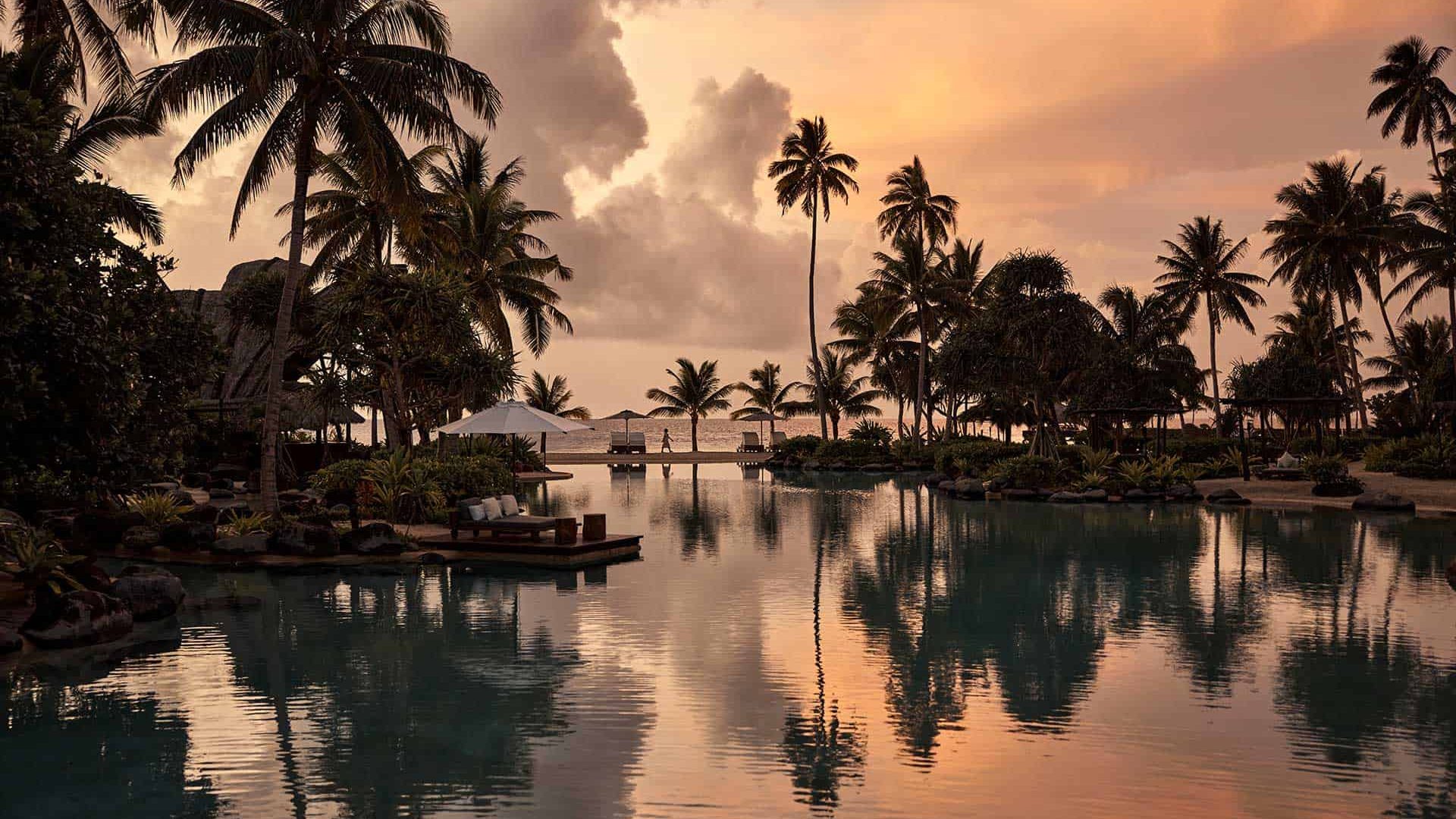 Laucala Island MM22-Main-Poo_Sunset-Views-pool-reflection