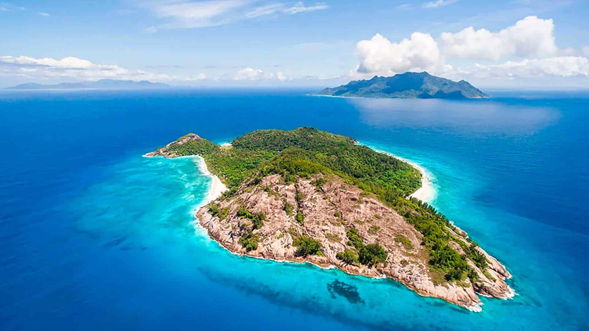 North-Island-aerial-with-silhouette-and-mahe-in-the-background